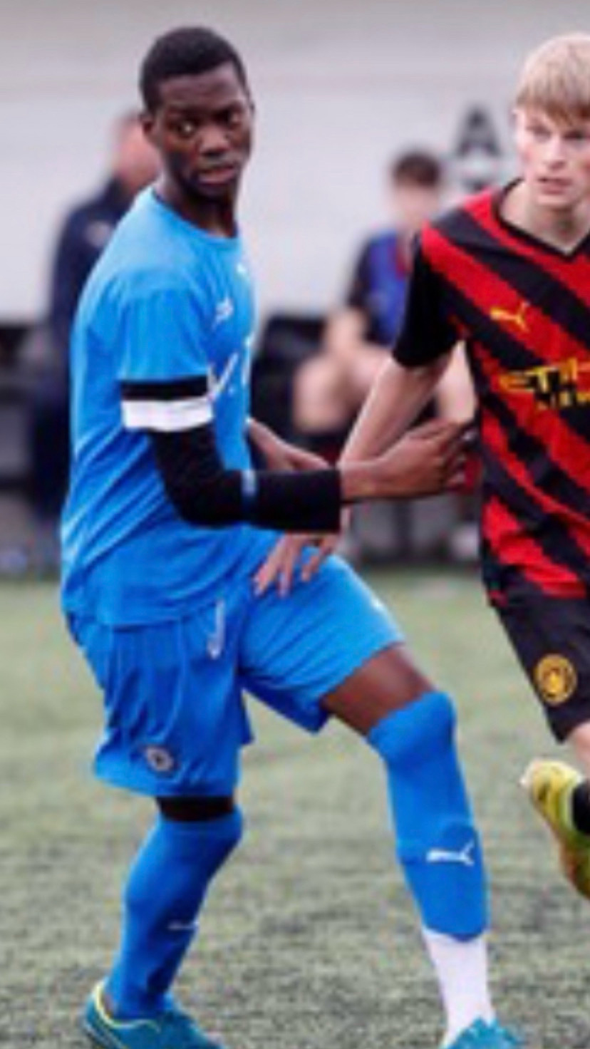 Raymond Sensalire Gala playing football for Stockport County